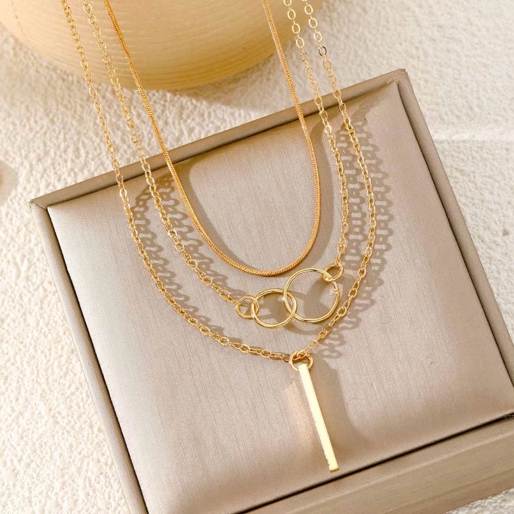 Gold Layered Necklace Set with Three Chains and Pendants - Picture 4 of 4